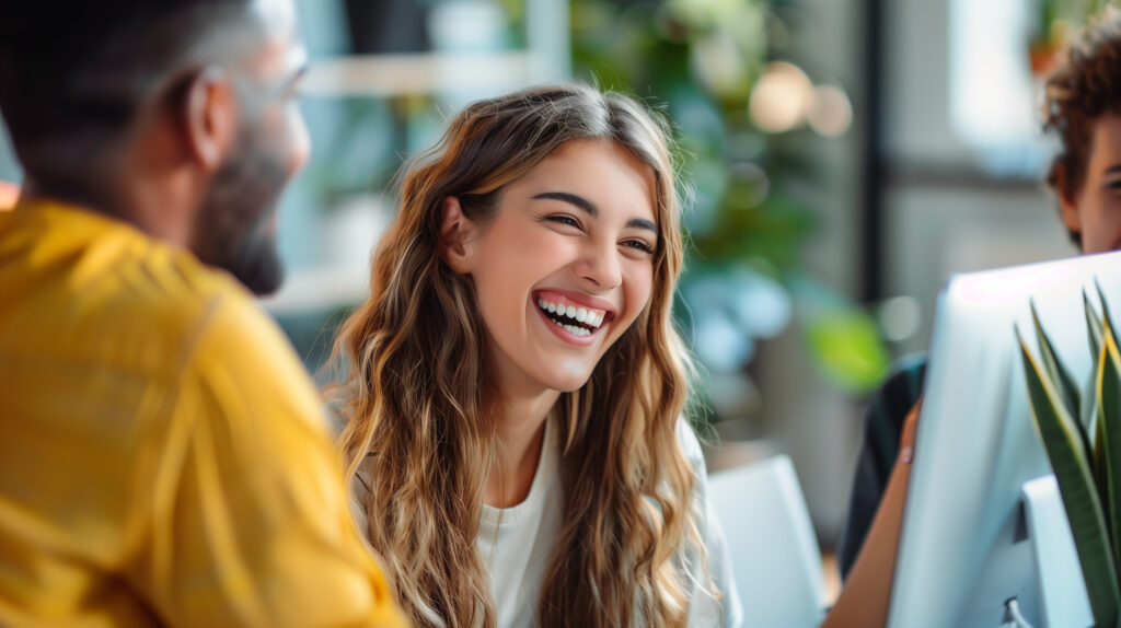 Smiling professional team in an office environment